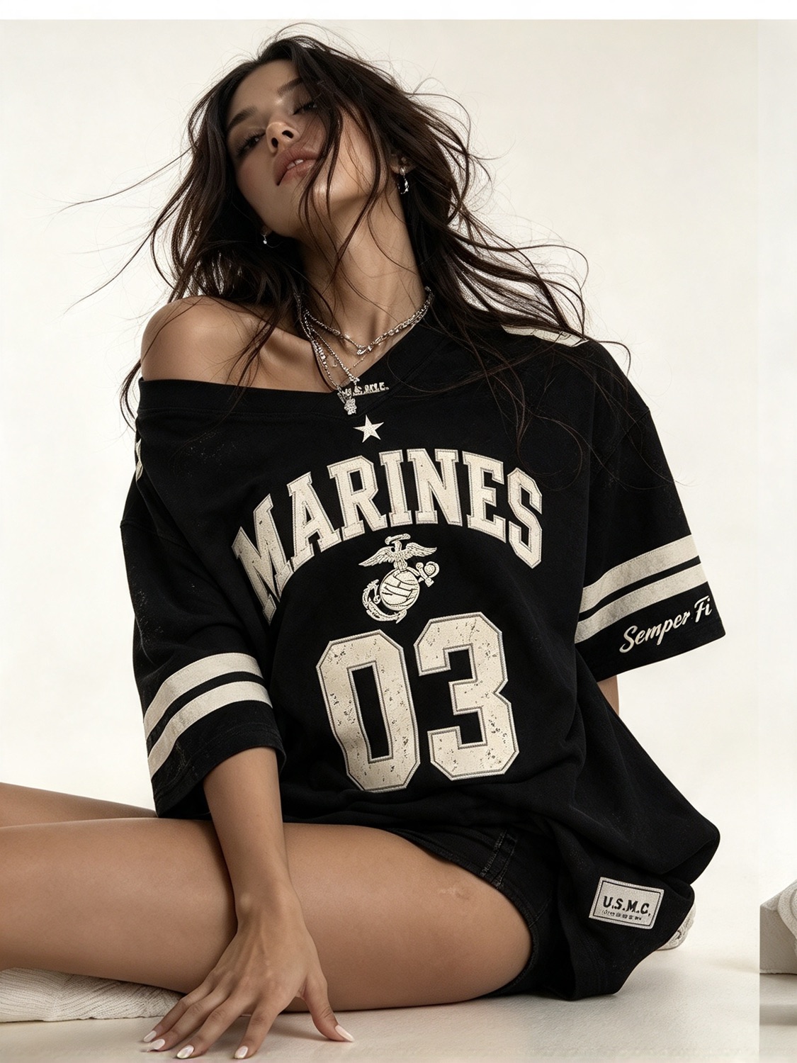 Seated in the black jersey